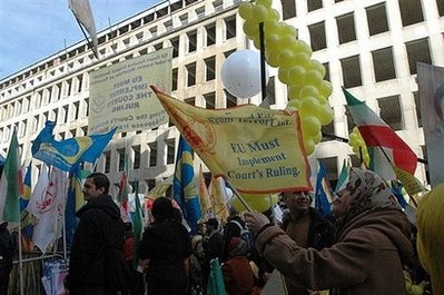 Iranians demonstrate outside EU headquarters in Brussels demanding PMOI's delisting
