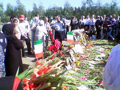 Families of victims gather at Khavaran Cemetary on the 17th anniversary of 1988 massacre of political prisoners by the Iranian regime. Families of victims gather at Khavaran Cemetary on the 17th anniversary of 1988 massacre of political prisoners by the Iranian regime.