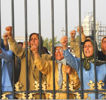 Camp Ashraf residents protest at the gate the forced entry of Iraqi Police into the Camp where some 3400 members of the main Iranian opposition group, the People’s Mpjahedin Organization of Iran (PMOI) are living in exile. Camp Ashraf residents protest at the gate the forced entry of Iraqi Police into the Camp where some 3400 members of the main Iranian opposition group, the People’s Mpjahedin Organization of Iran (PMOI) are living in exile.