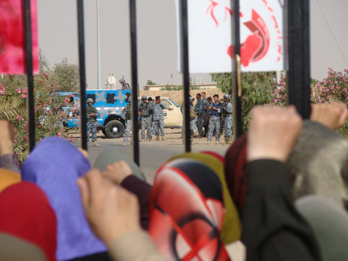 Since 5:30 am (local time - Iraq) on Friday, June 5, rapid deployment forces of the Iraqi police at the entrance of Ashraf, blocked the road and entrance to Ashraf. They blocked entry of goods and people to the Camp and intensified the suppressive siege of Ashraf. Eight members of the People's Mojahedin Organization of Iran who were at the entry point of the Camp were threatened by arrest and death. A group of camp residents protest illegal intrusion by Police.