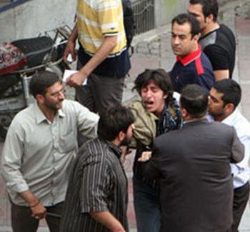 Photo: A young protestor moments before he was arrested and brutally murdered by the Iranian regime’s agents. Plainclothes agents wrestled him to the ground and slit his throat with a knife. Tehran, June 21, 2009 Photo: A young protestor moments before he was arrested and brutally murdered by the Iranian regime’s agents. Plainclothes agents wrestled him to the ground and slit his throat with a knife. Tehran, June 21, 2009