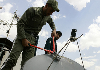 Satellite dishes removed by Iranian regime's State Security Forces Satellite dishes removed by Iranian regime's State Security Forces