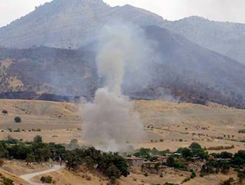 Smoke rose from the site of an attack last August 200 miles north of Baghdad. Villagers said Iranian regime had shelled the area. Smoke rose from the site of an attack last August 200 miles north of Baghdad. Villagers said Iranian regime had shelled the area.