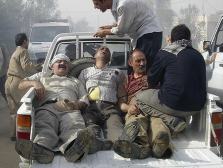 ashraf-wounded-1 Spanish judge mulls probe of Iraq refugee camp massacre