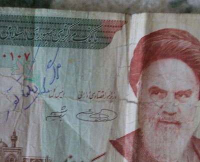 "Down with dictator," written of banknote "Down with dictator," written of banknote