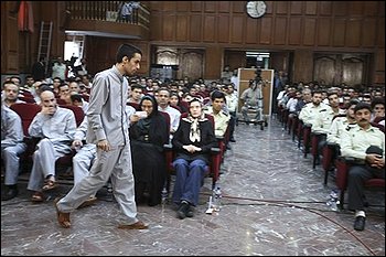 In this Saturday, Aug. 8, 2009, photo, released by the state-run Fars News Agency, Arash Rahmanipour, walks through the "revolutionary court" in Tehran, Iran. He was executed Jan 28, 2010. In this Saturday, Aug. 8, 2009, photo, released by the state-run Fars News Agency, Arash Rahmanipour, walks through the "revolutionary court" in Tehran, Iran. He was executed Jan 28, 2010.