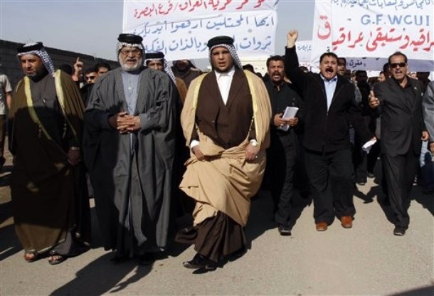 Iraqi demonstrators chant slogans against Iranian regime to protest the Iranian regime's seizure of the al-Fakka oil field in front of the Iranian regime's embassy in Basra, Iraq, Saturday, Jan. 2, 2010. Iraqi demonstrators chant slogans against Iranian regime to protest the Iranian regime's seizure of the al-Fakka oil field in front of the Iranian regime's embassy in Basra, Iraq, Saturday, Jan. 2, 2010.