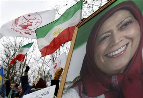 Protestors rally alongside a poster of Maryam Rajavi, head of the National Council of Resistance of Iran outside the Iranian embassy in London, Thursday, Dec. 31, 2009. Supporters of the People's Mujahedeen Organization of Iran rallied outside the Iranian embassy in solidarity with the uprising in Iran. Protestors rally alongside a poster of Maryam Rajavi, head of the National Council of Resistance of Iran outside the Iranian embassy in London, Thursday, Dec. 31, 2009. Supporters of the People's Mujahedeen Organization of Iran rallied outside the Iranian embassy in solidarity with the uprising in Iran.