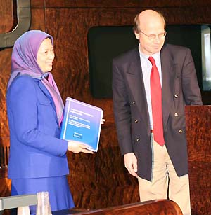 Mr. Kimmo Sasi and Mrs.Maryam Rajavi, President-elect of Iranian Resistance A book containing the signatures of the lawmakers was presented to Mrs. Rajavi by Mr. Kimmo Sasi, the Chairman of the Finnish Parliament's Constitutional Law Committee.