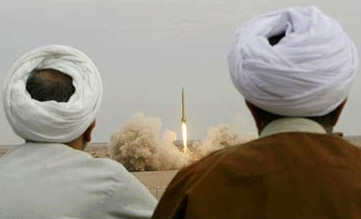 Iranian mullahs watch a test of a nuclear-capable Shahab-3 missiles, with a range of 2,000 km, outside Qom, Iran. Iranian mullahs watch a test of a nuclear-capable Shahab-3 missiles, with a range of 2,000 km, outside Qom, Iran.
