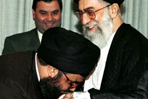 Leader of Hezbollah kissing hand of Ali Khamenei