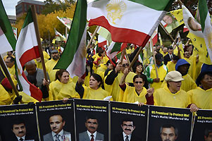 Protesters chant slogans outside the White House during a rally against the visit of Nouri al-Maliki to the U.S.