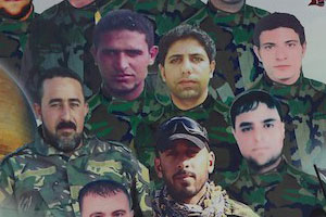 Poster in Baghdad street displays pictures of Iraqis killed in Syria fighting for Assad Poster in Baghdad street displays pictures of Iraqis killed in Syria fighting for Assad