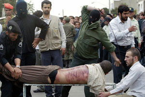 A man is being lashed in public in Iran, 2007 A man is being lashed in public in Iran, 2007
