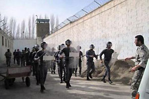 Anti-riot prison guards maneuvering in a prison in Iran Anti-riot prison guards maneuvering in a prison in Iran