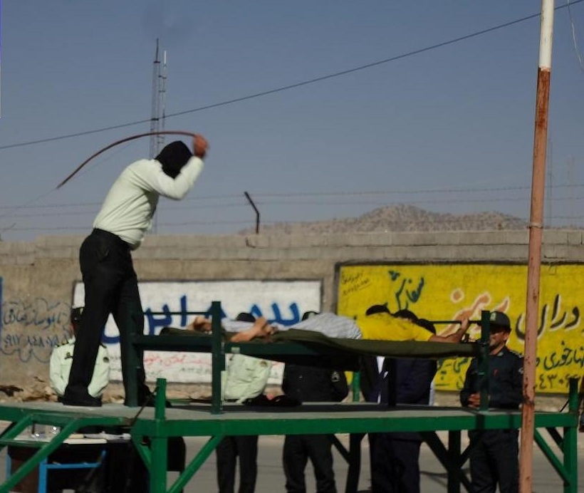 Man being lashed in public in Iran, August 7, 2014