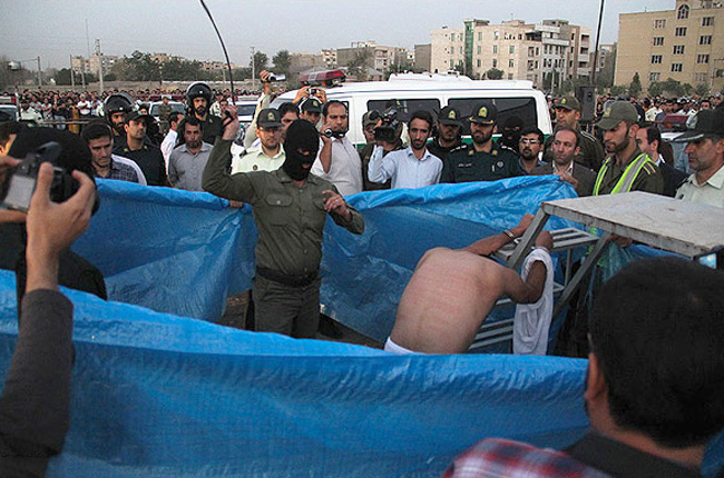 Iran: Prisoner lashed in public moments before being hanged.