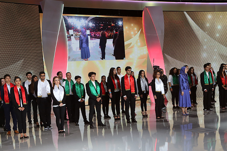 Young Iranians rally behind opposition leader Maryam Rajavi, President-elect of the NCRI, in Iran Freedom rally on June 13, 2015 in Paris (Villepinte)