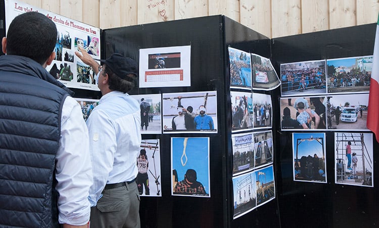Iranians hold stand in Paris' Trocadero Square to expose the appalling human rights violations in Iran, July 30, 2015
