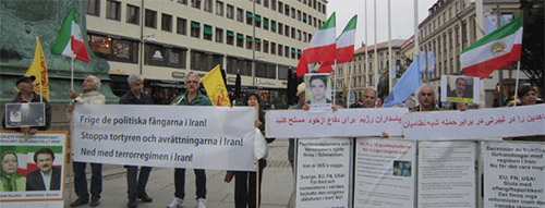 sweden3-500 Supporters of the PMOI (MEK) in Sweden condemn execution of Iranian Kurdish political prisoner Behrouz Alkhani in Iran. August 26, 2015