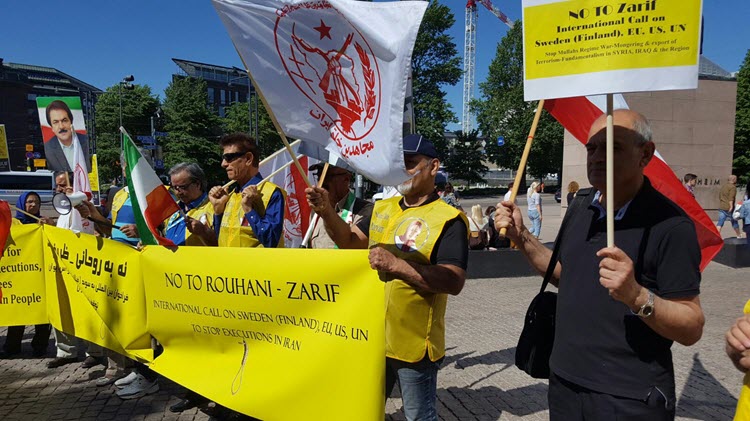 pmoi-supporters-finland-denounce-presence-of-iran-regime-s-fm-750 pmoi-supporters-finland-denounce-presence-of-iran-regime-s-fm-750